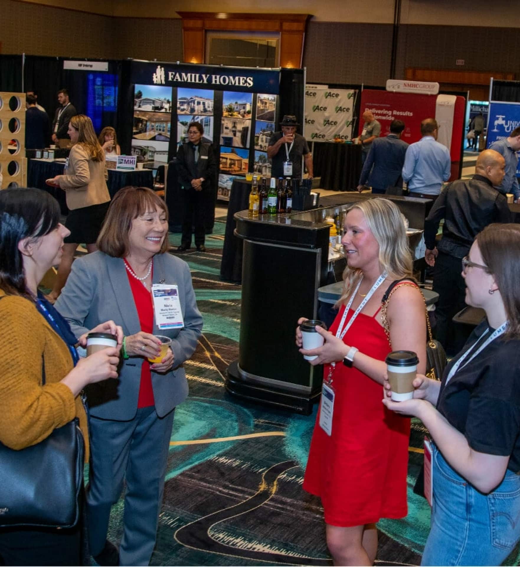 Group chatting at 2023 MHI Vegas Event